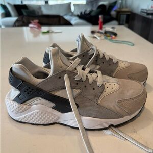 Nike Gray and Black Sneakers with Signature Heel Counter